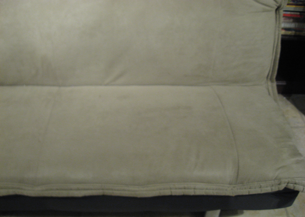 Black Futon with a Tan Suede Microfiber Cushion