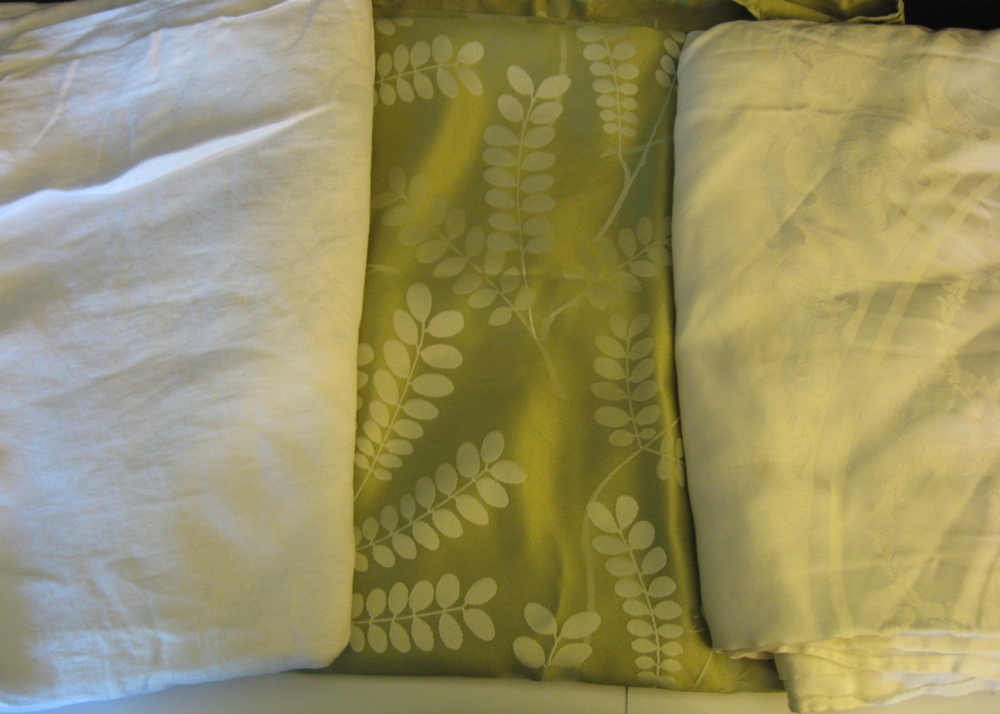 Assortment of Lace and Damask Home Accessories