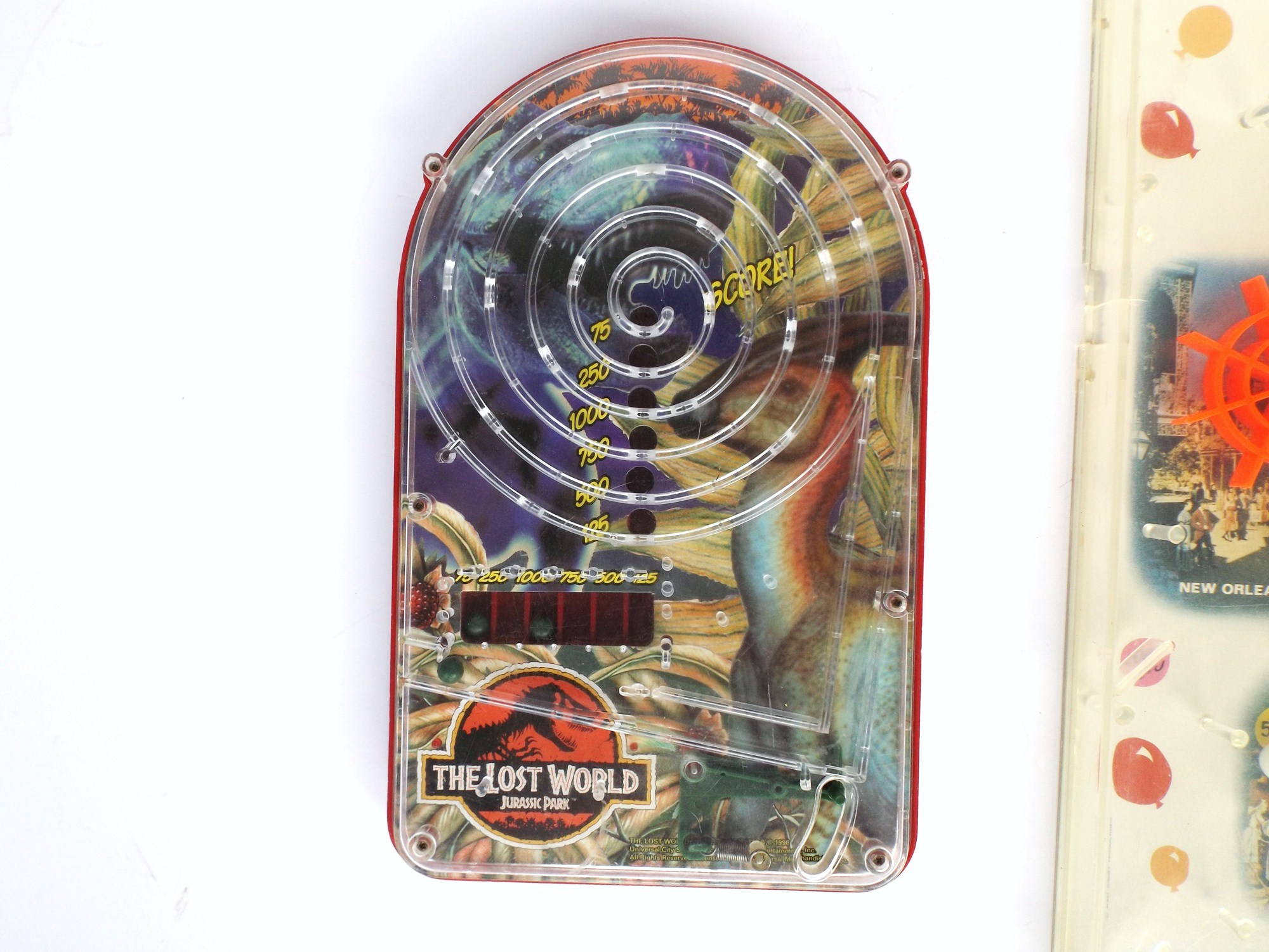 Jurassac Park and Disney Magic Kingdom Pin Ball Games