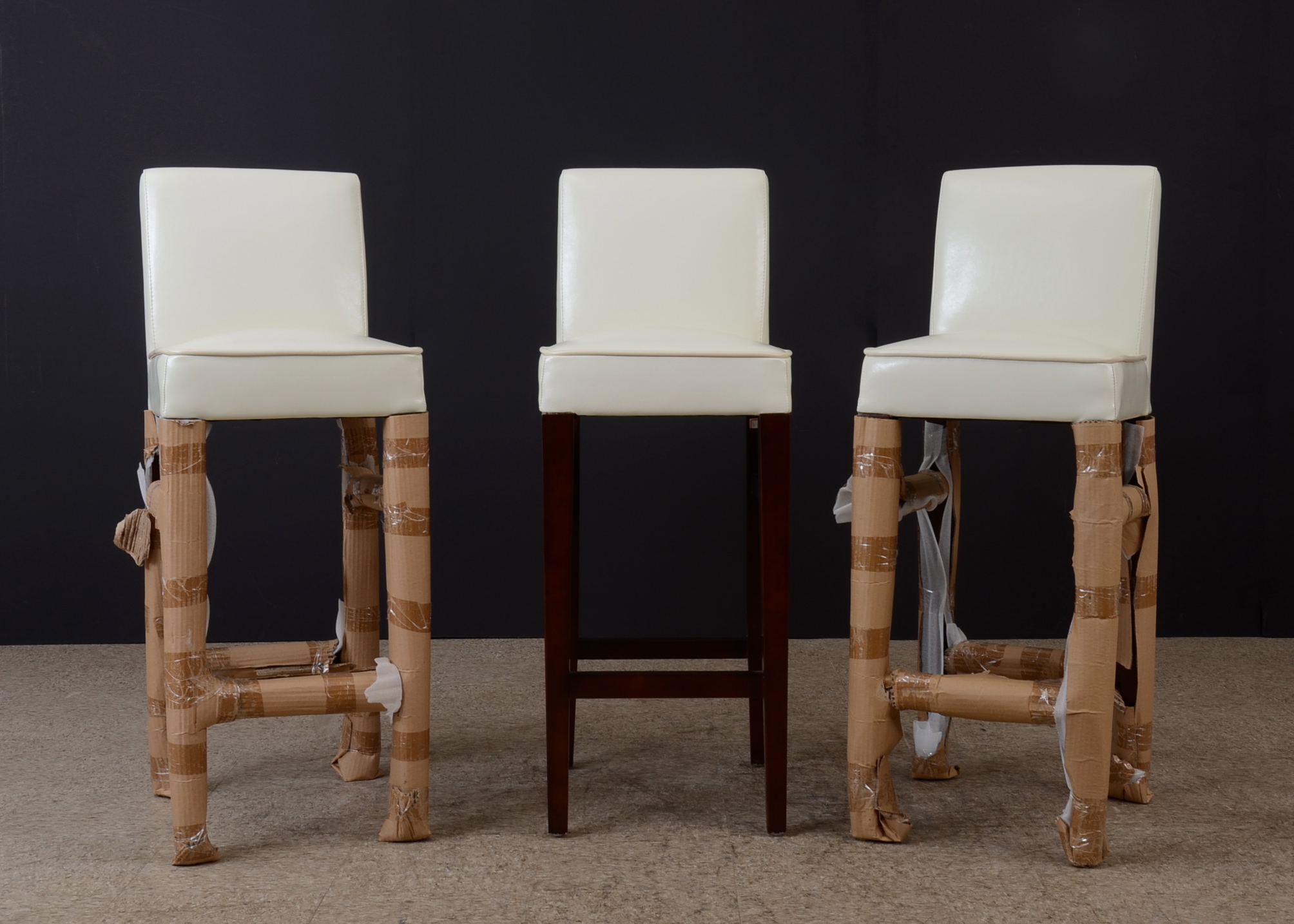 Set of Three White Leather Bar Stools