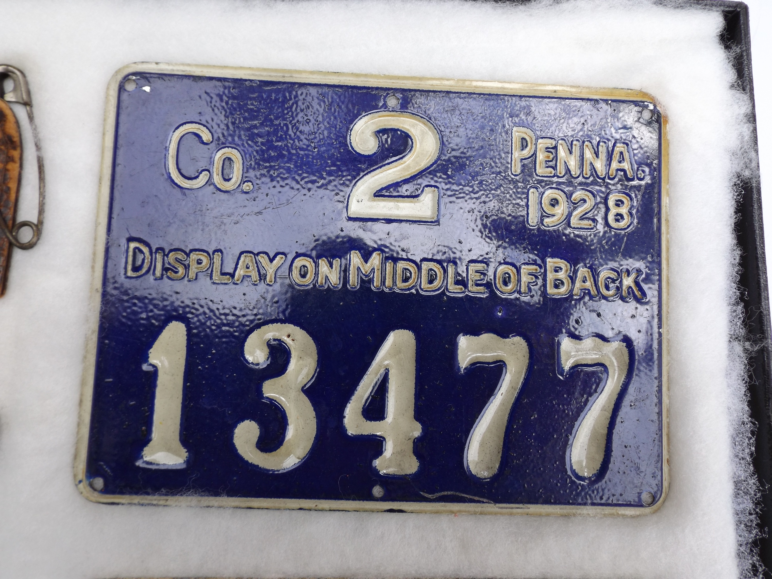 Group of Old Metal Hunting Licenses