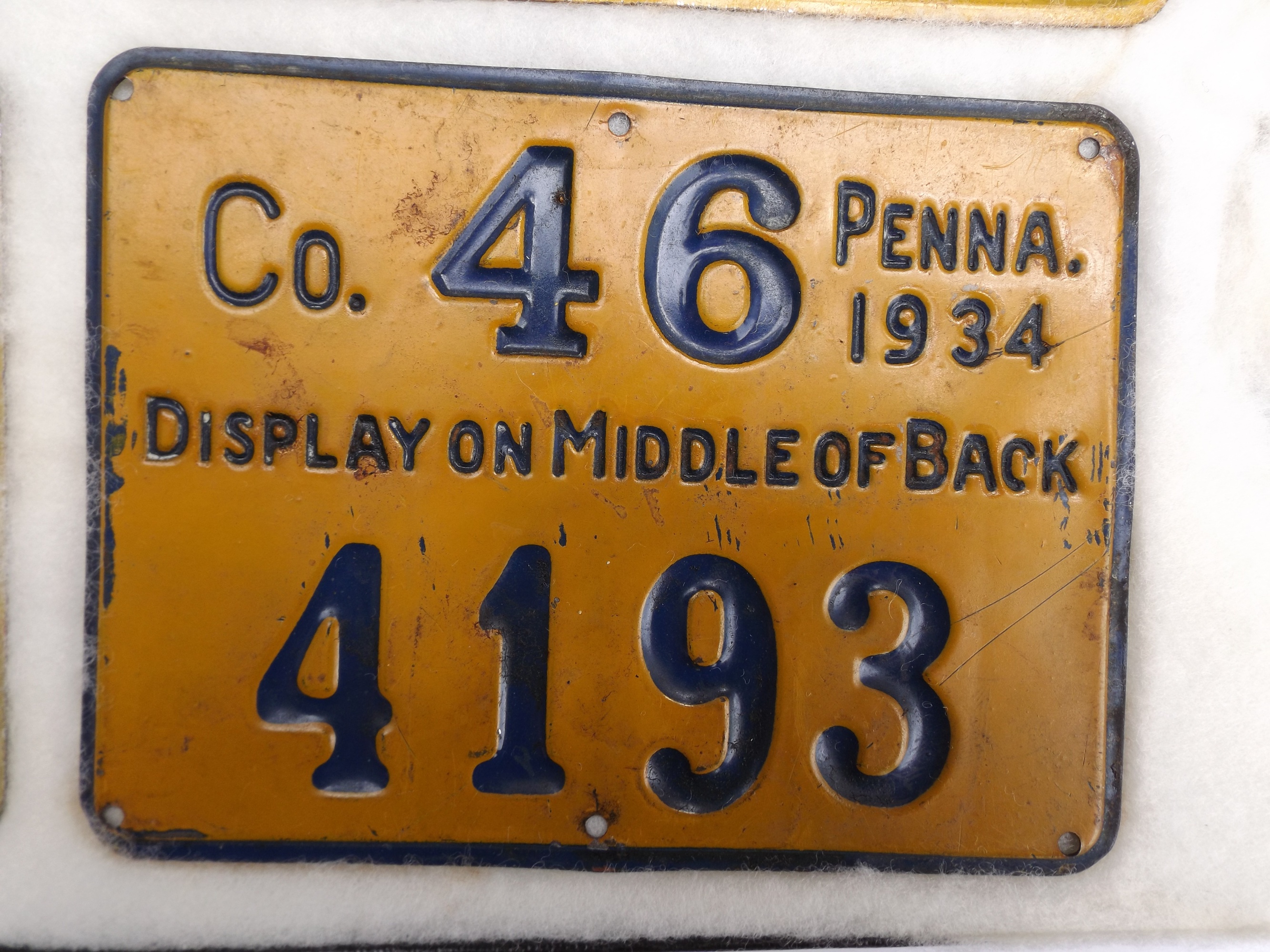 Group of Old Metal Hunting Licenses