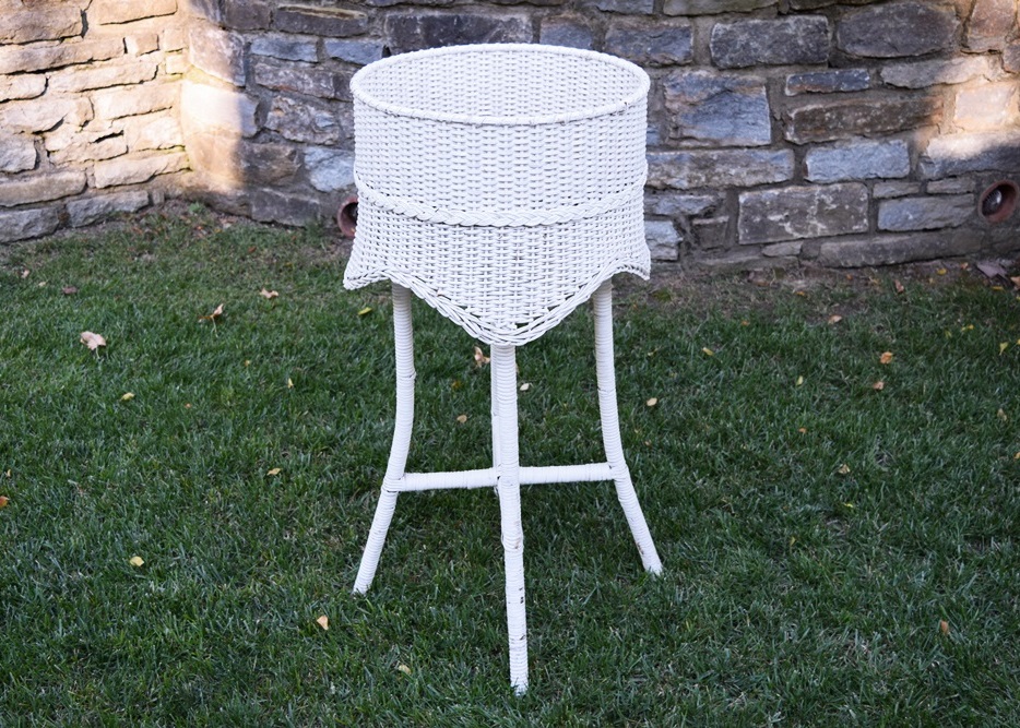 A Vintage White Wicker Plant Stand