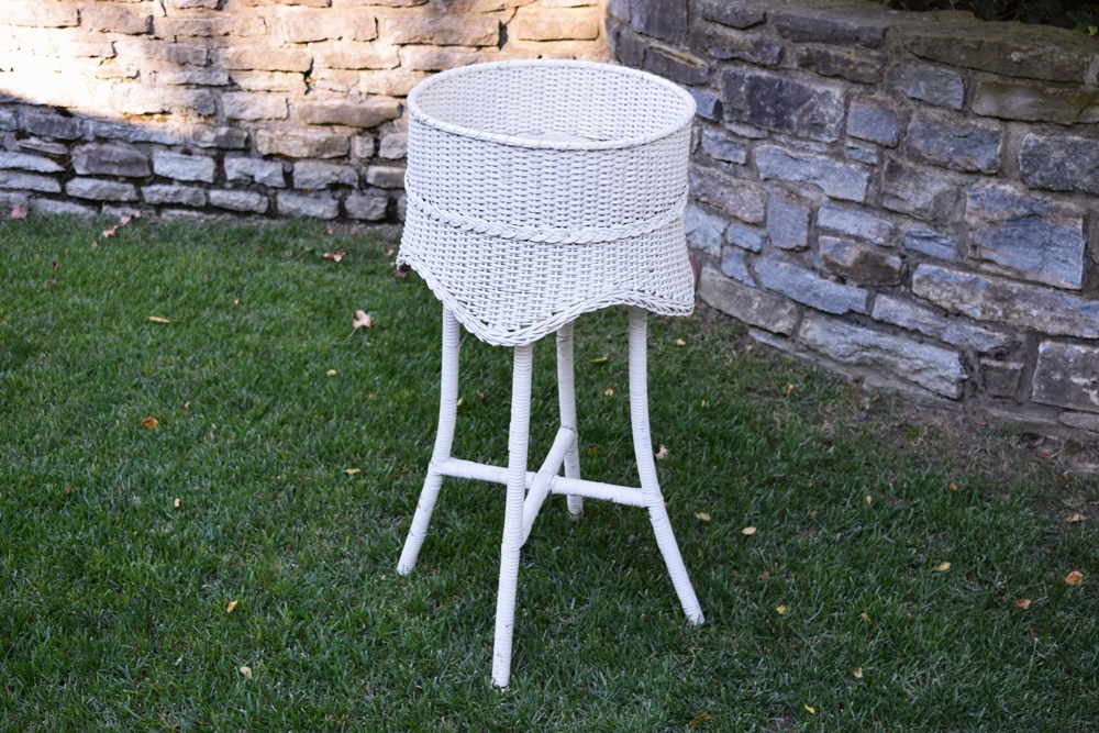 A Vintage White Wicker Plant Stand