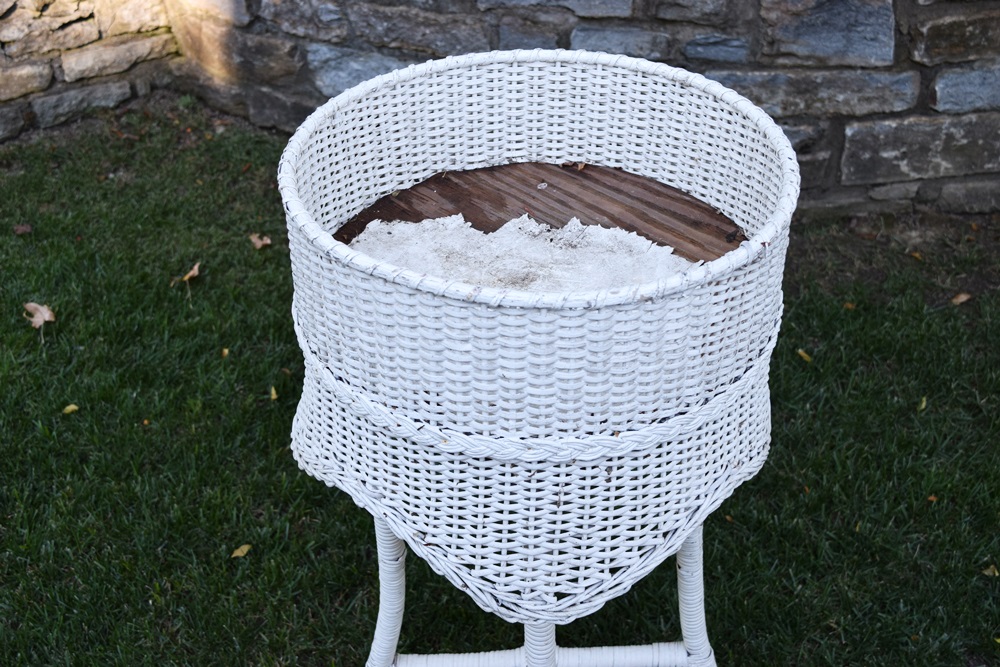 A Vintage White Wicker Plant Stand