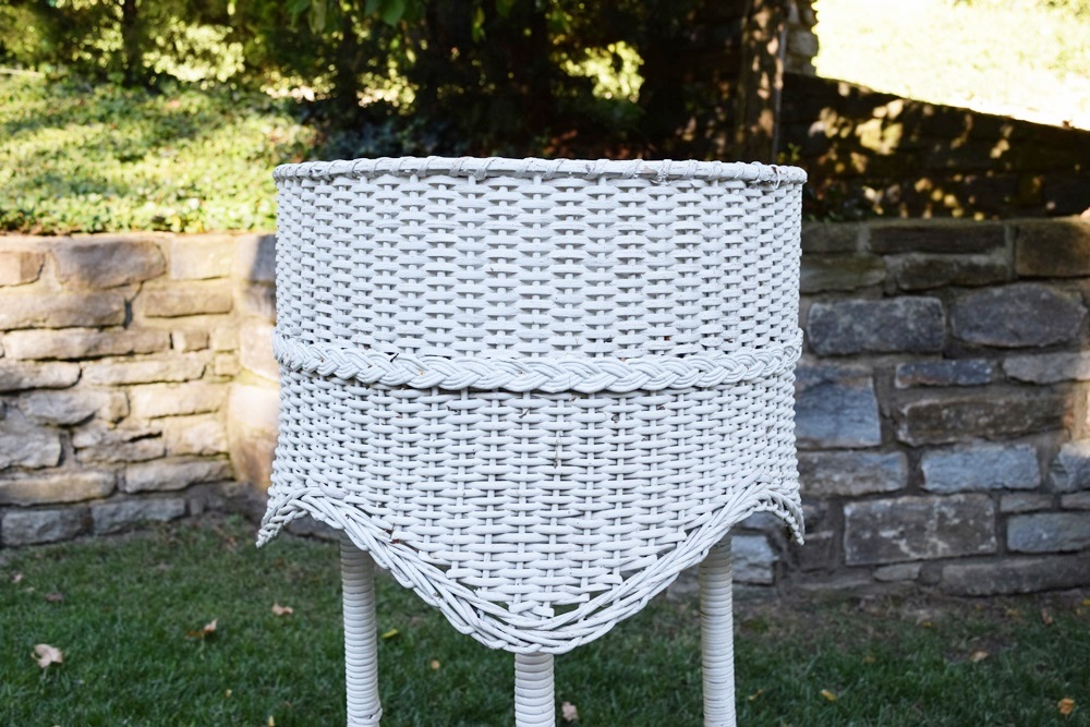 A Vintage White Wicker Plant Stand