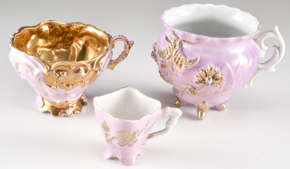 Three Hand-Painted Porcelain Tea Cups