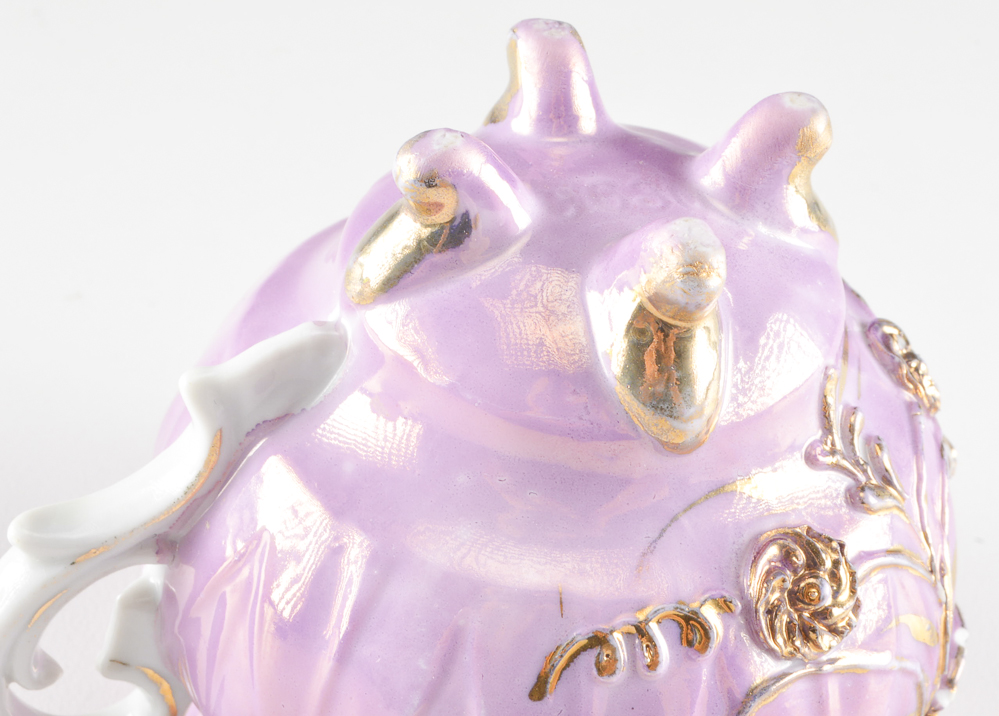 Three Hand-Painted Porcelain Tea Cups