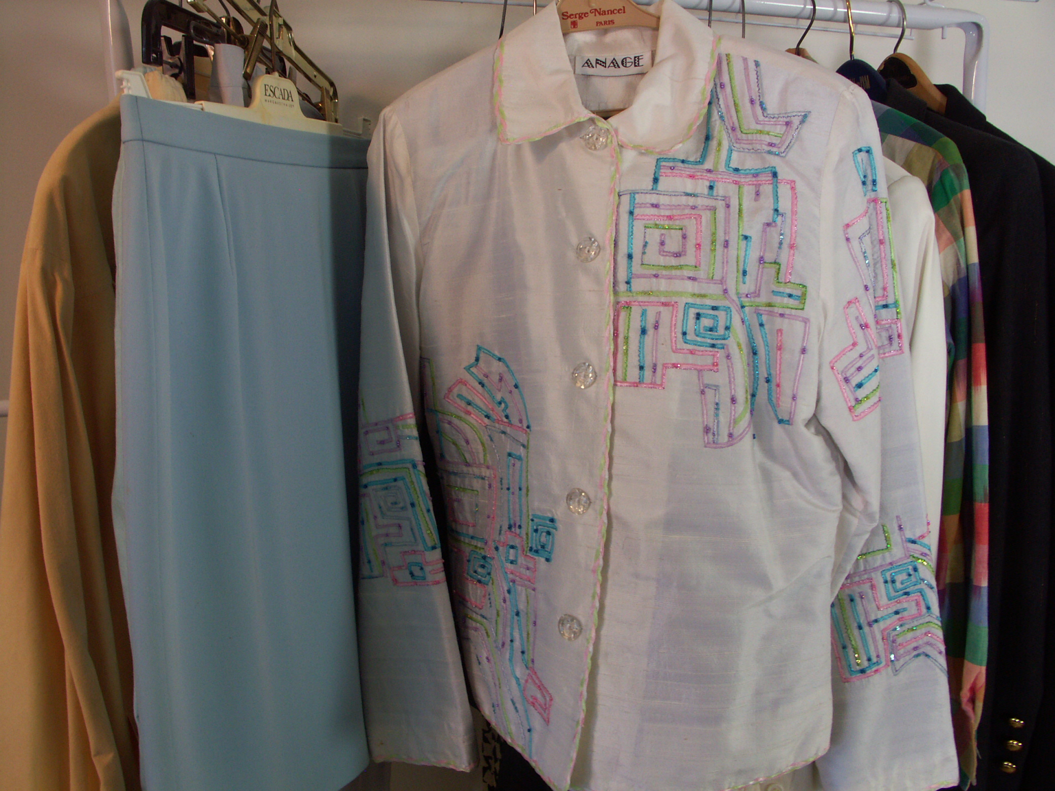 Large Lot of Women's Designer Suits, Jackets, Skirts