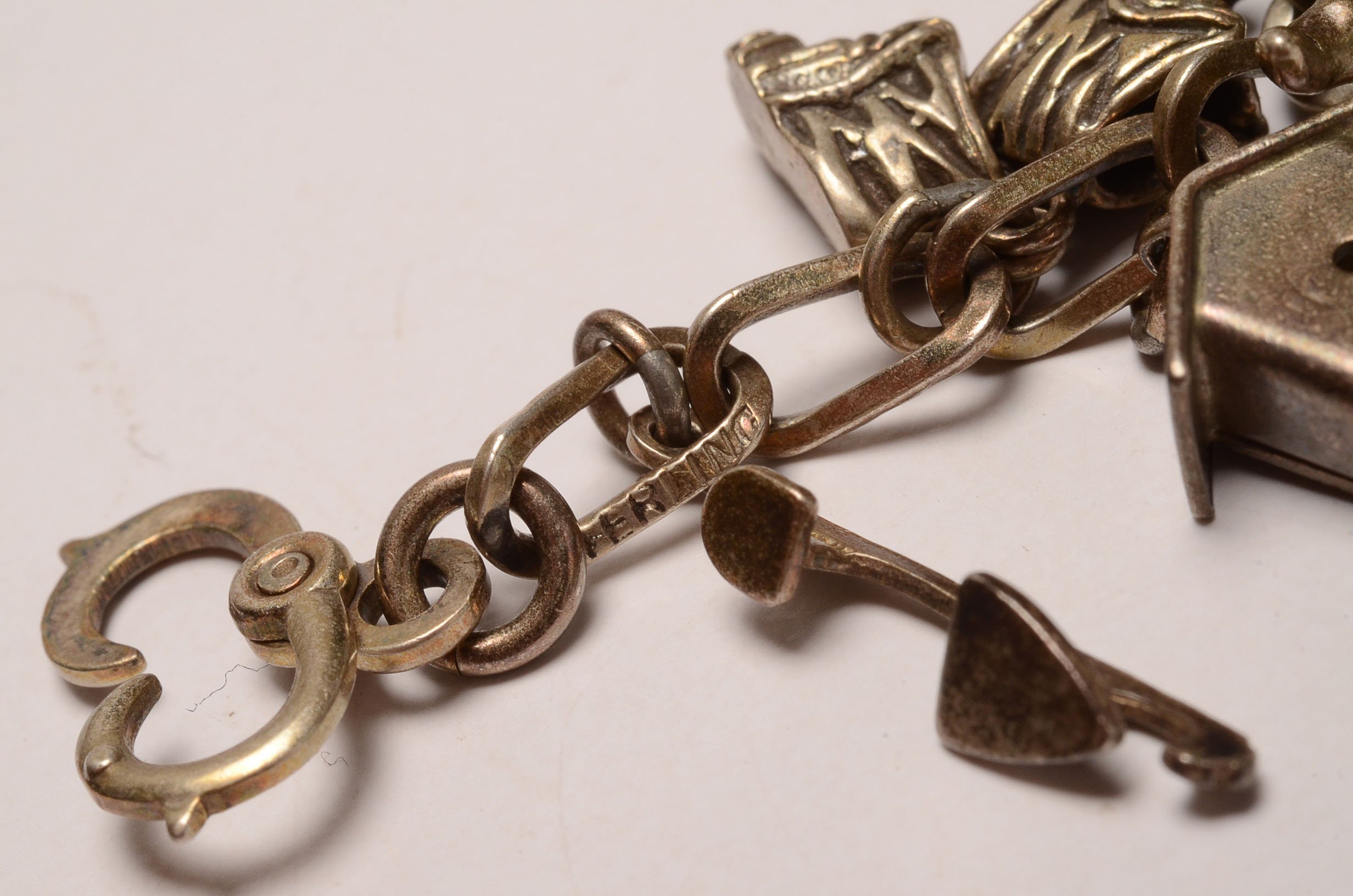 Two Vintage Sterling Silver Charm Bracelets with Numerous Charms