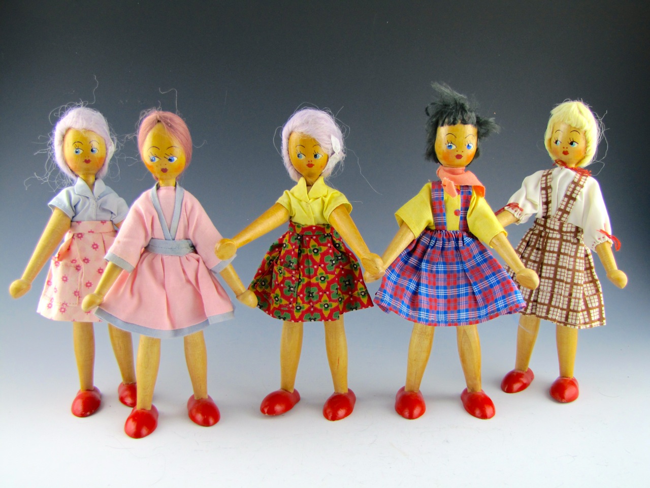 Vintage Collection of Twelve Wooden Pin Dolls Handmade in Poland