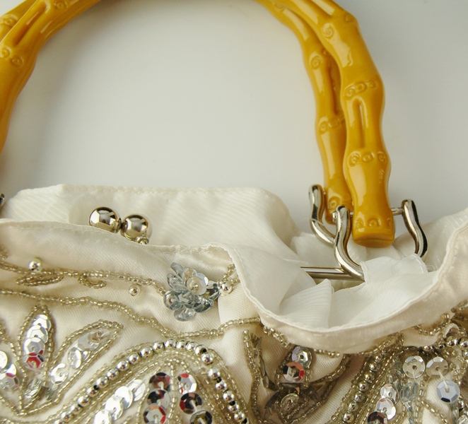 Three Black and Ivory Evening Bags