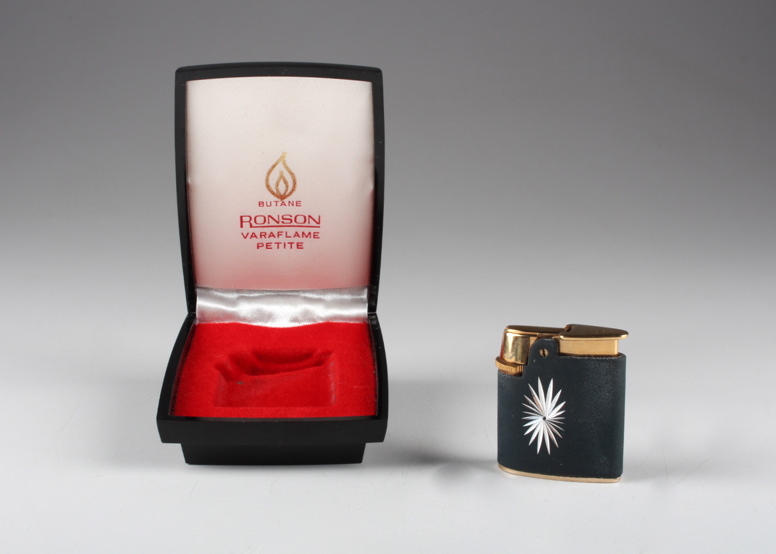 A Group of Four Vintage Lighters