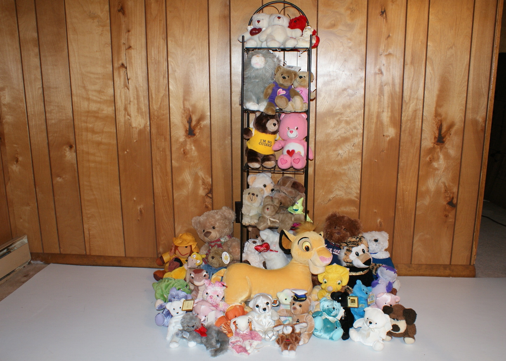 Stuffed Animal Collection on a Metal Shelf