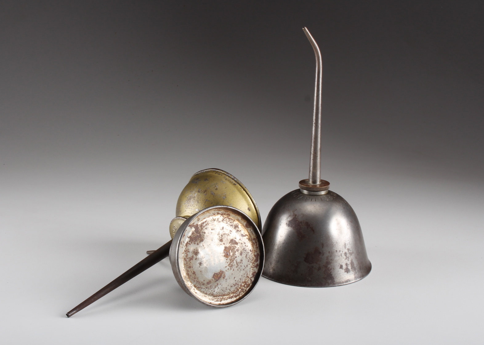 Eight Vintage Oil Cans