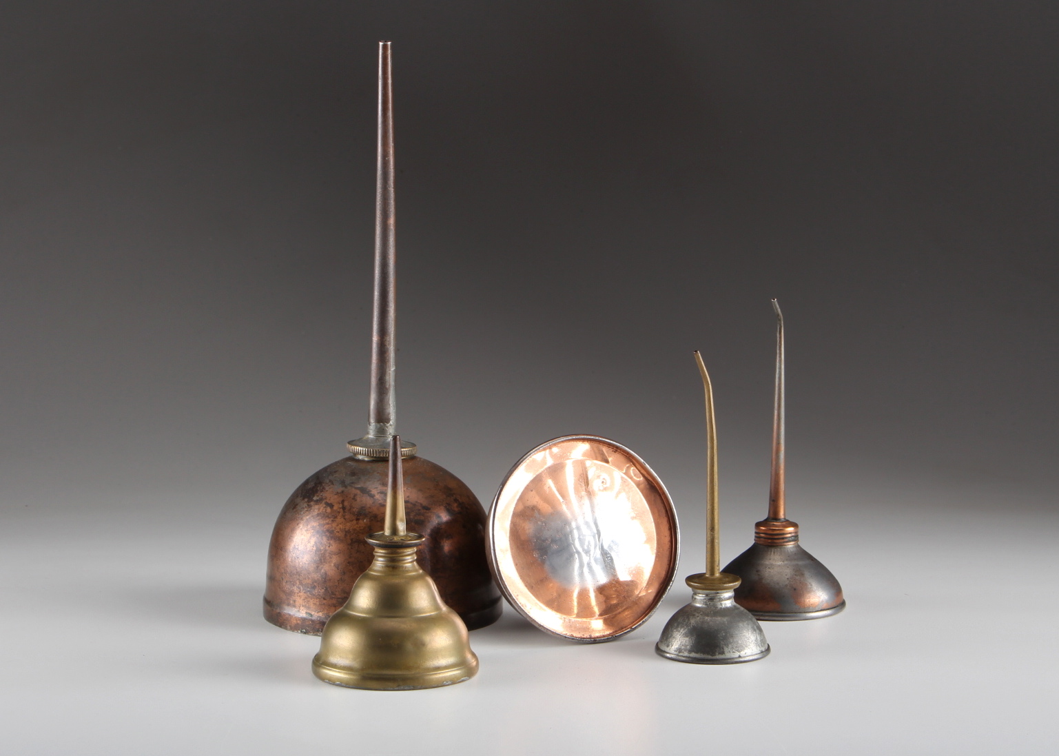 Eight Vintage Oil Cans