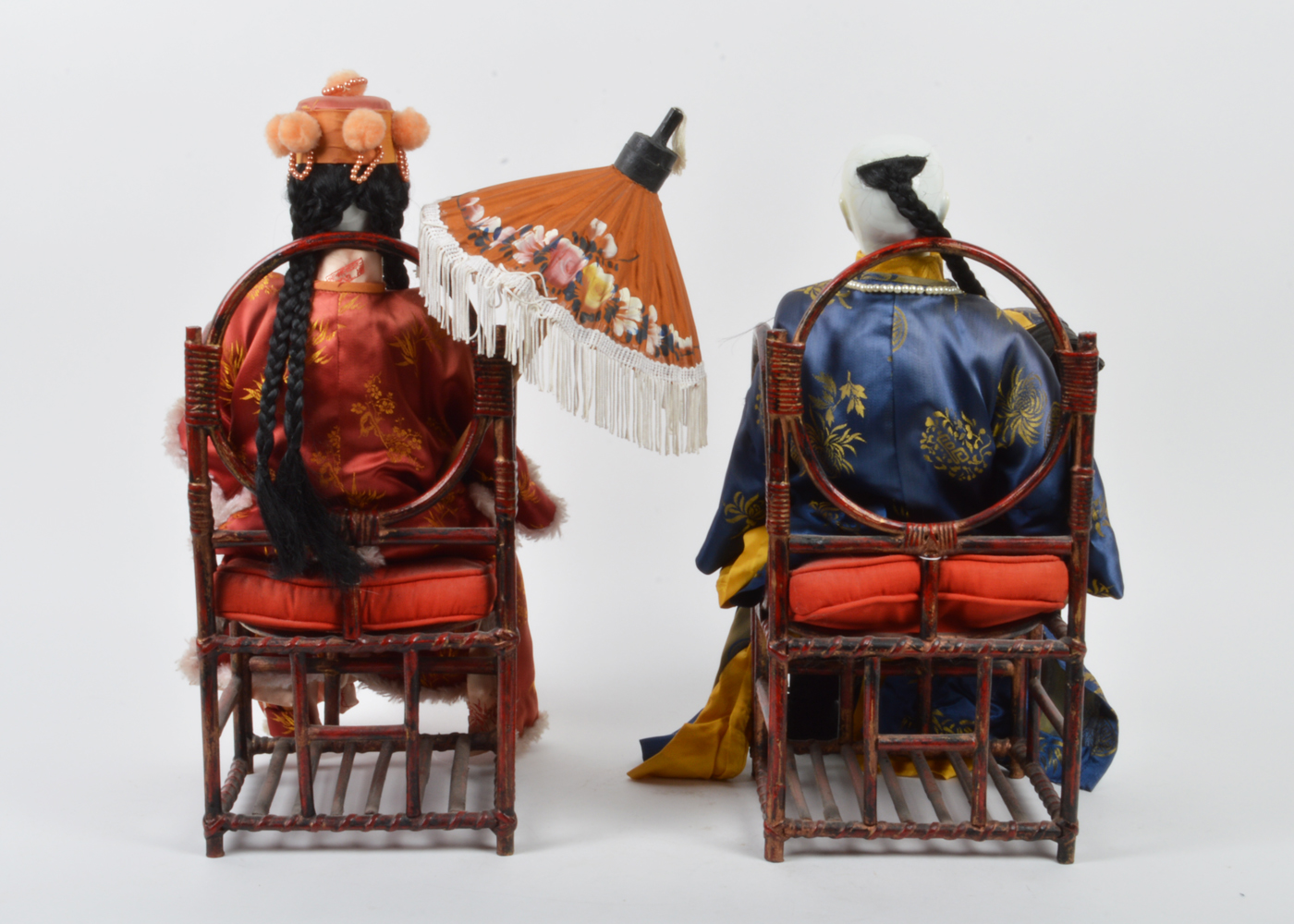 Pair of Large Hand Painted Porcelain Orma Dolls