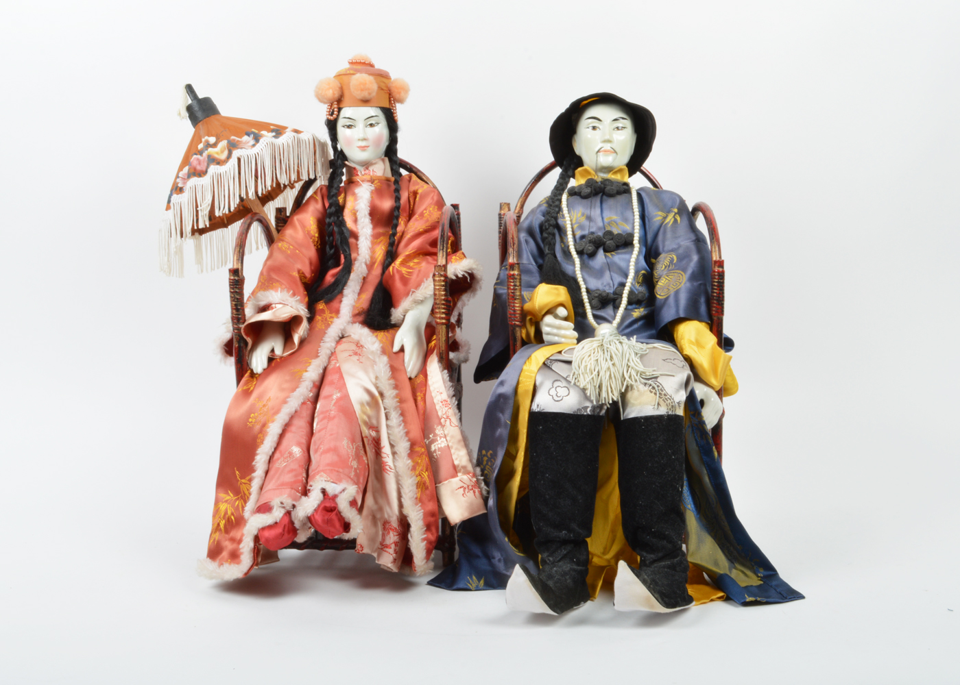 Pair of Large Hand Painted Porcelain Orma Dolls