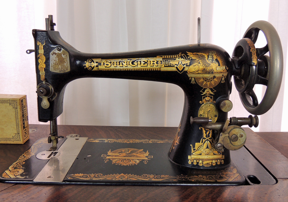 Antique Sphinx Model 27 Singer Treadle Sewing Machine and Cabinet