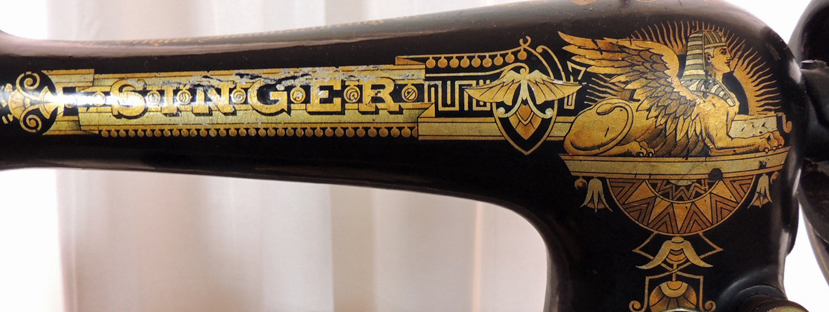 Antique Sphinx Model 27 Singer Treadle Sewing Machine and Cabinet