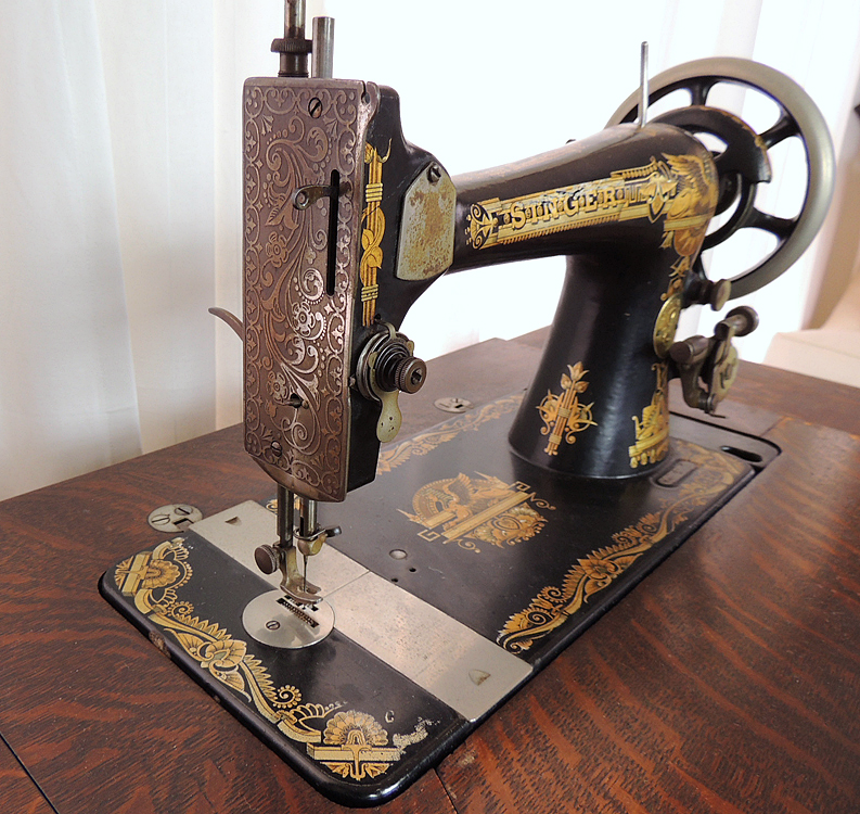 Antique Sphinx Model 27 Singer Treadle Sewing Machine and Cabinet