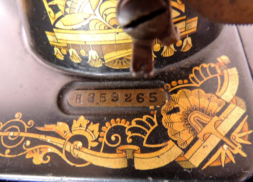 Antique Sphinx Model 27 Singer Treadle Sewing Machine and Cabinet