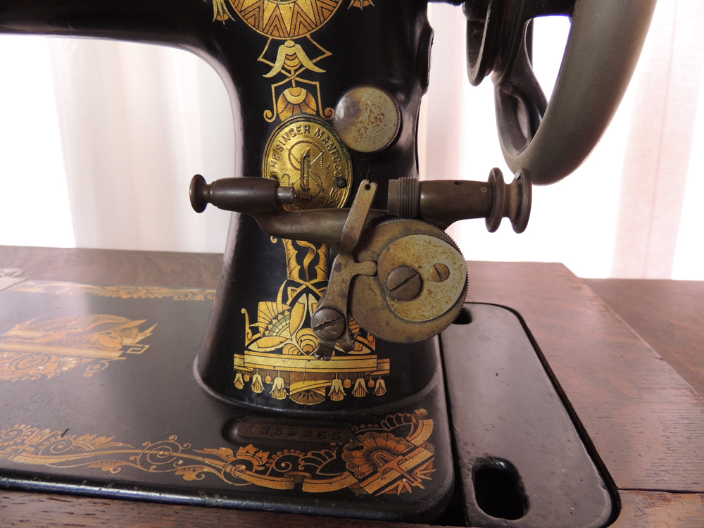 Antique Sphinx Model 27 Singer Treadle Sewing Machine and Cabinet