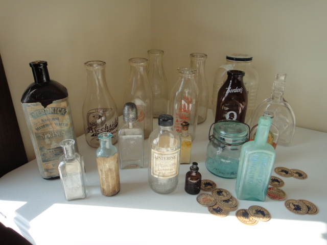 Eighteen Vintage Milk and Medicine Bottles