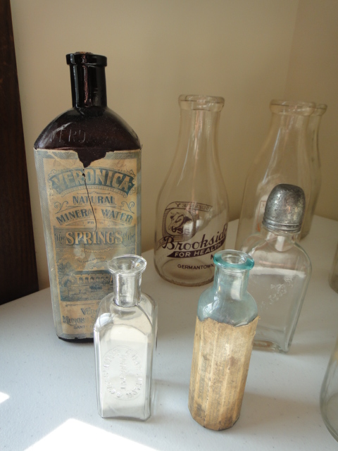 Eighteen Vintage Milk and Medicine Bottles