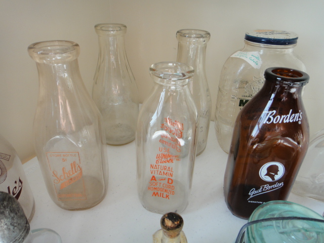 Eighteen Vintage Milk and Medicine Bottles