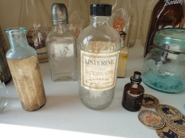Eighteen Vintage Milk and Medicine Bottles