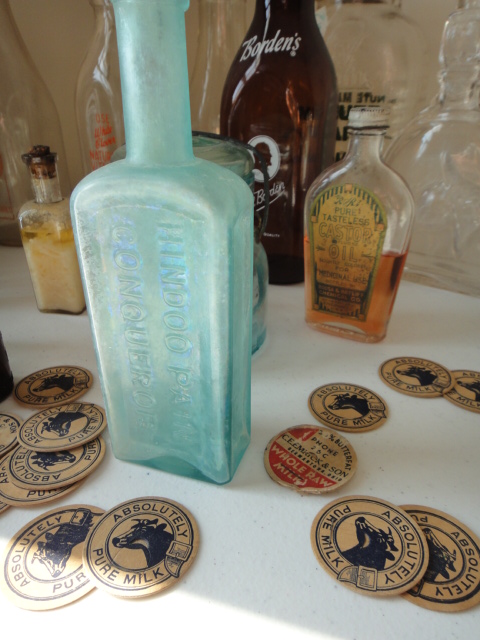 Eighteen Vintage Milk and Medicine Bottles
