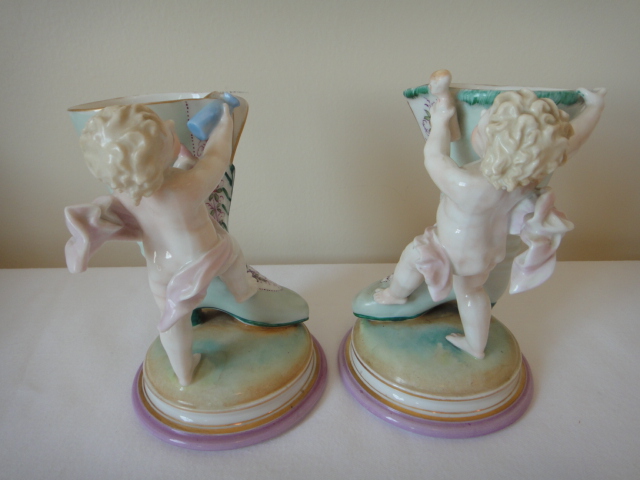 Pair of Vintage Cherub Boot Vases