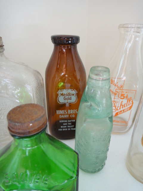 Sixteen Vintage Bottles and Paine's Celery Compound Bottle