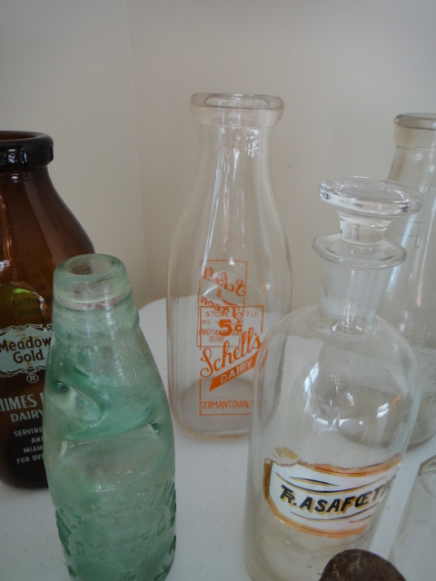 Sixteen Vintage Bottles and Paine's Celery Compound Bottle