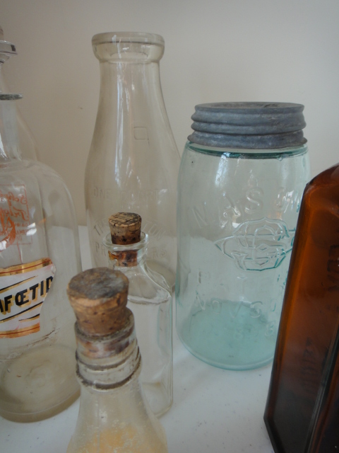 Sixteen Vintage Bottles and Paine's Celery Compound Bottle