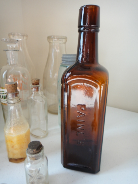 Sixteen Vintage Bottles and Paine's Celery Compound Bottle