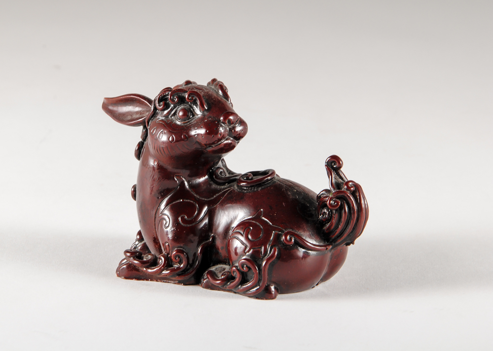 Chinese Red Resin Buddha's and Rabbit Figurines