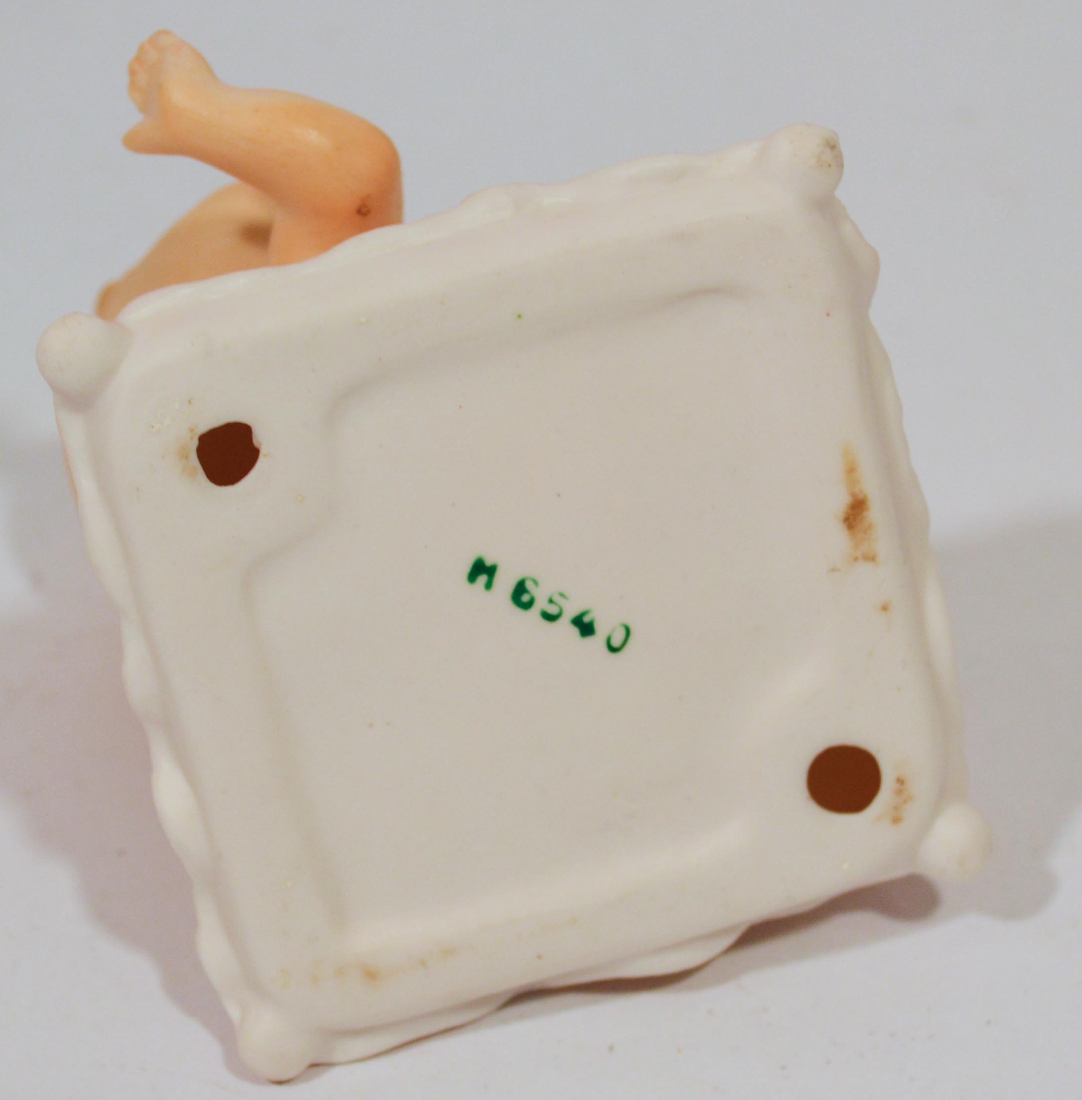 Porcelain Napco Ware Kewpie Dolls on Pillows