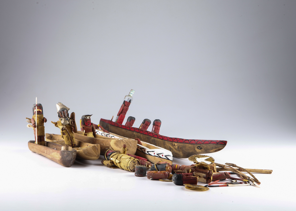 Modern Native American Inspired Warriors in Canoes