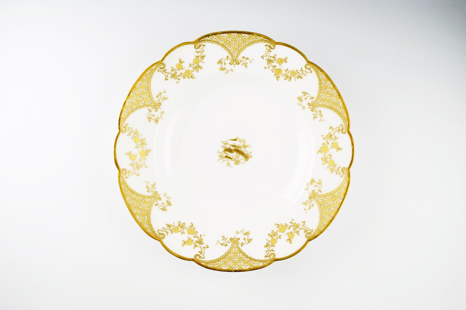 A Set of Twelve Antique Haviland & Co. Limoges Gold Rimmed Bowls