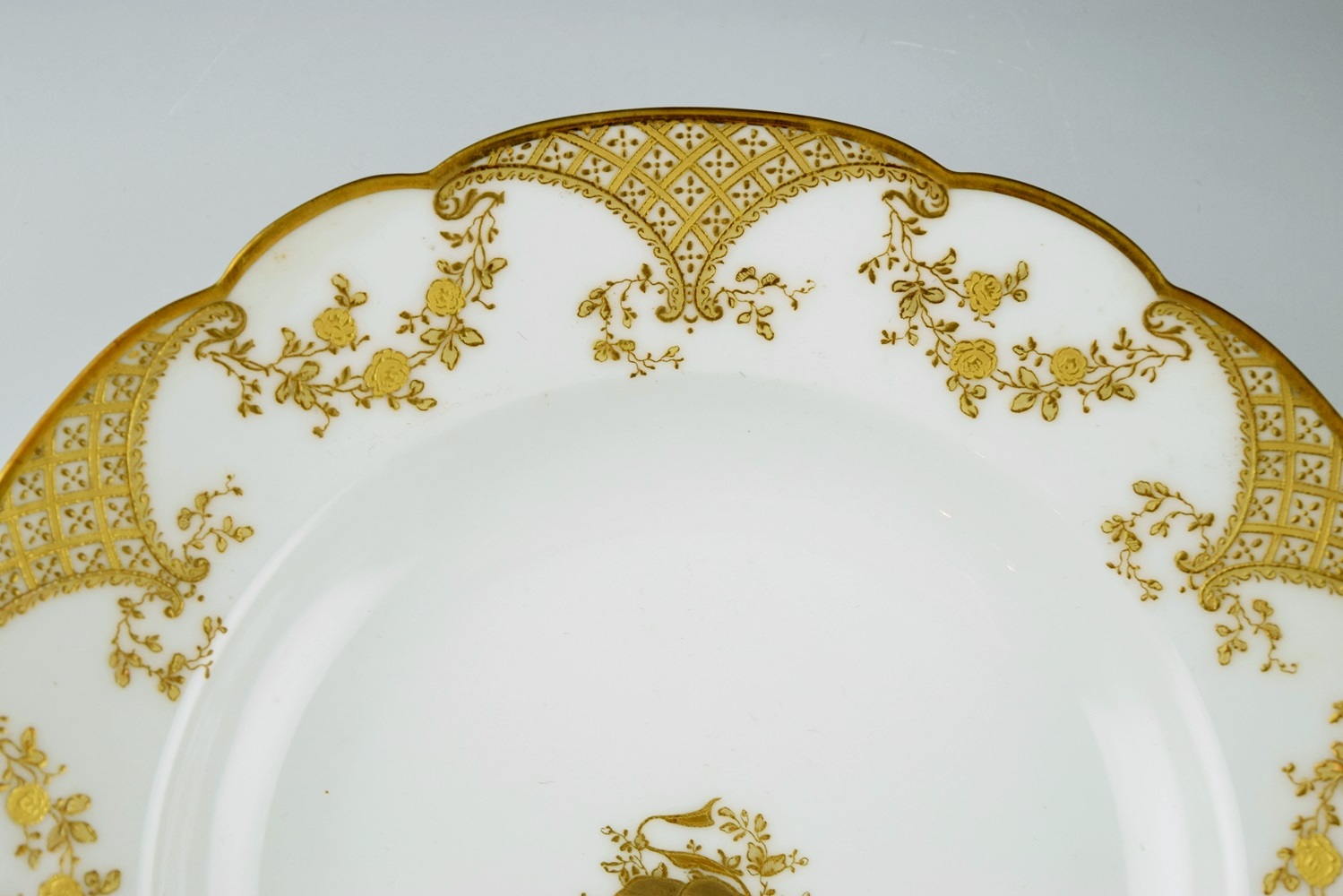 A Set of Twelve Antique Haviland & Co. Limoges Gold Rimmed Bowls