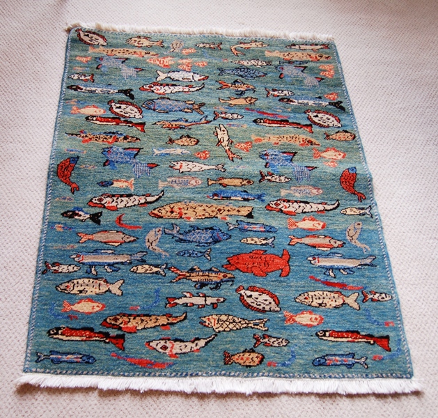 Woven Legends Fish Rug Featured in National Geographic Magazine