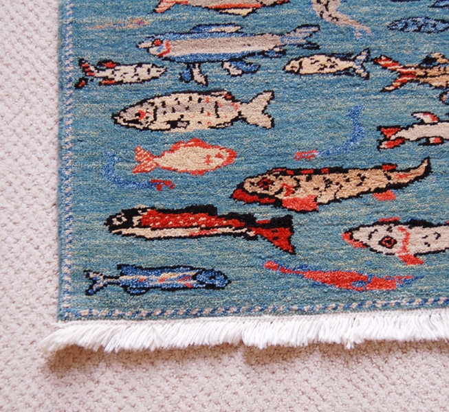 Woven Legends Fish Rug Featured in National Geographic Magazine