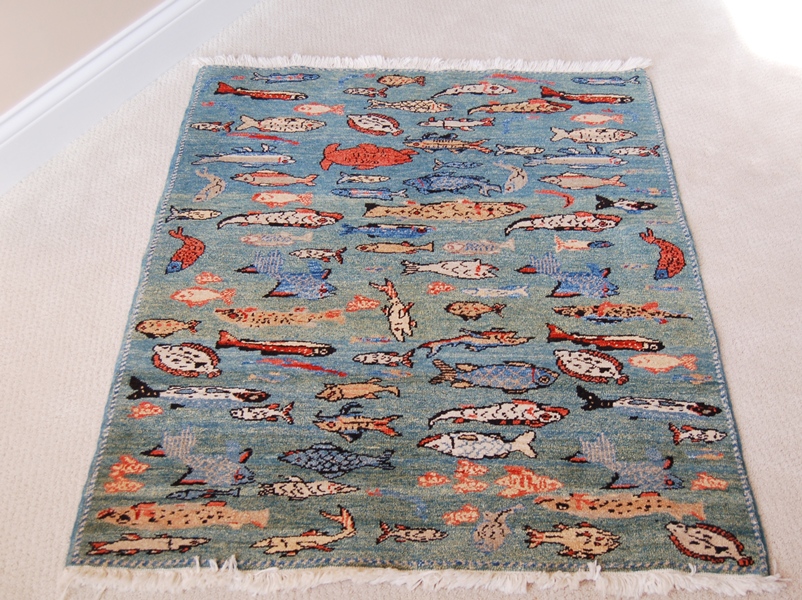 Woven Legends Fish Rug Featured in National Geographic Magazine