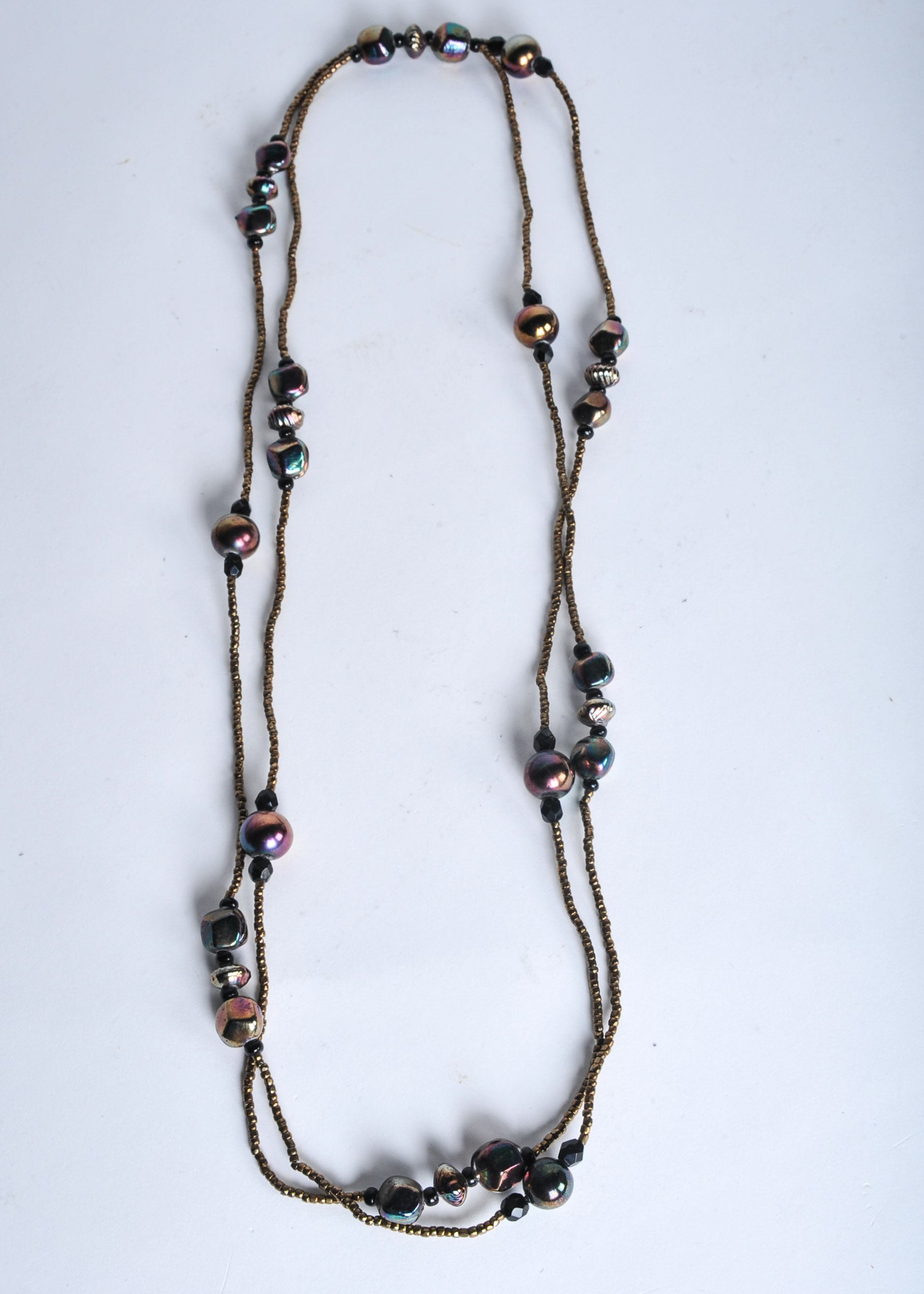 "Sacred Journey" by Lonnie Lovness and Modern Ceramic Necklaces