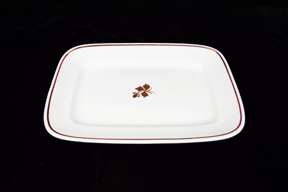 An Antique "Royal Ironstone China" Platter with Copper Lustre