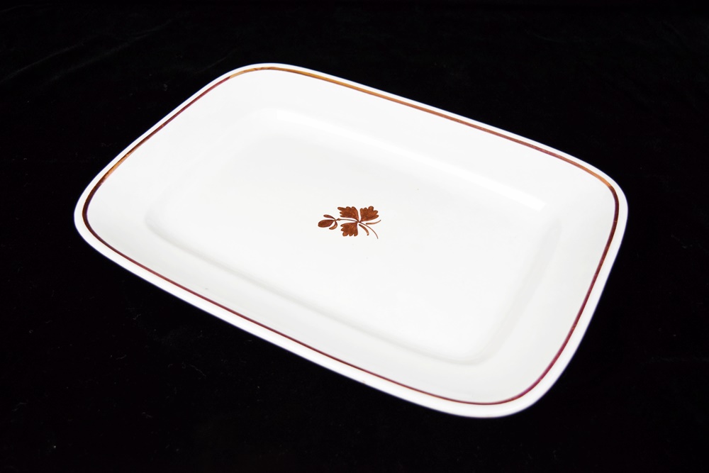 An Antique "Royal Ironstone China" Platter with Copper Lustre
