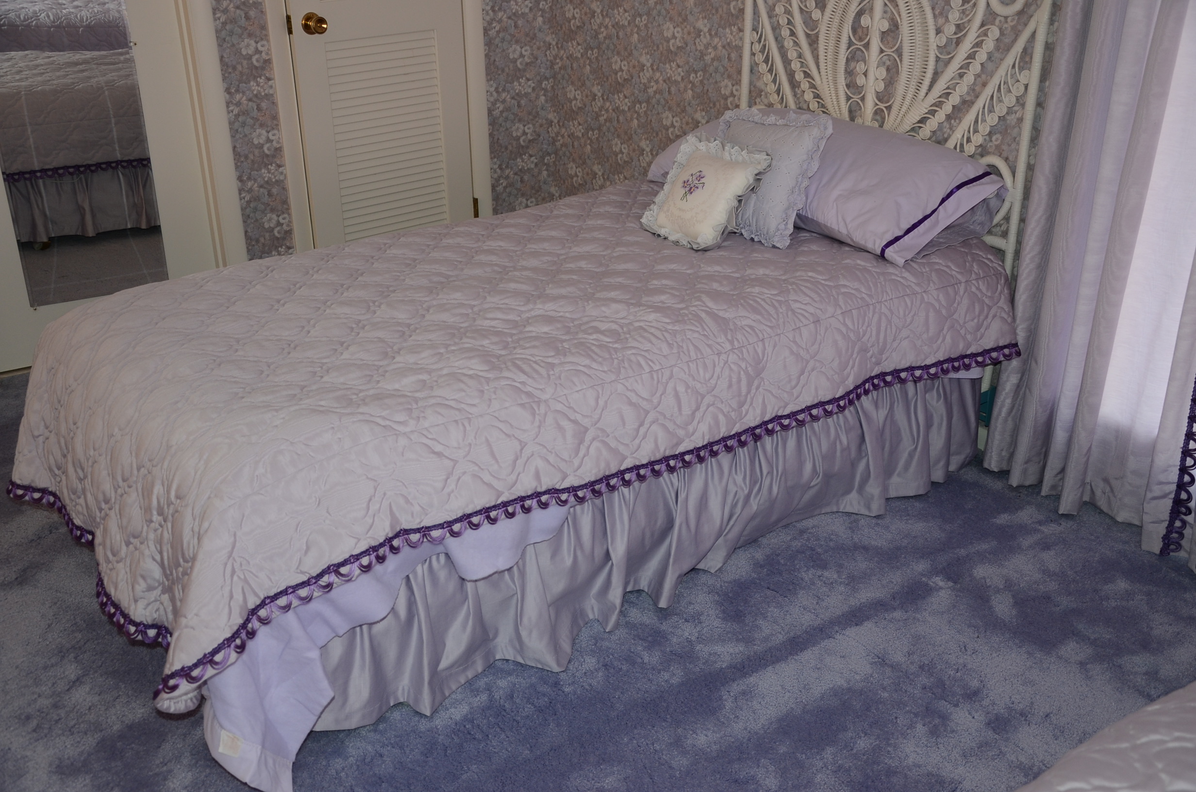 Pair of Twin White Wicker Beds with Violet Linens