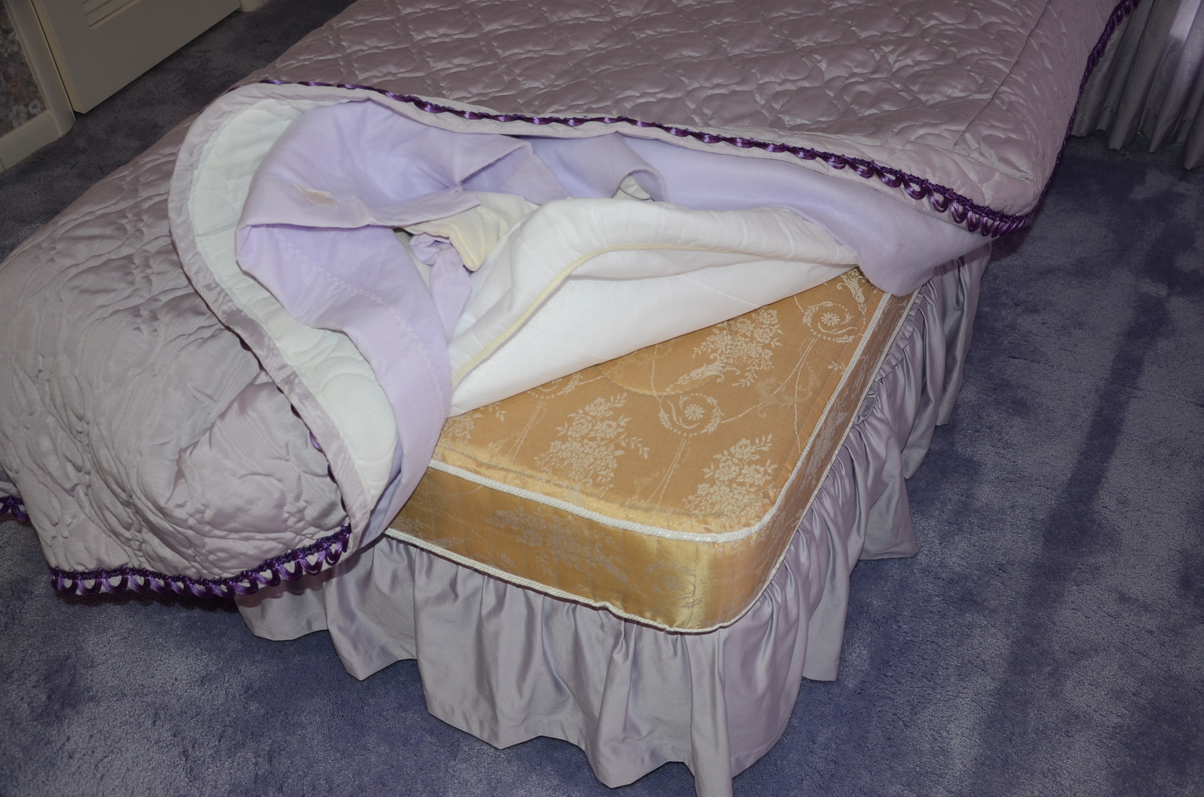 Pair of Twin White Wicker Beds with Violet Linens